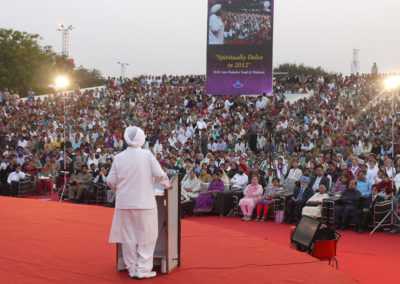 Delivering a spiritual talk during a Book Release program.